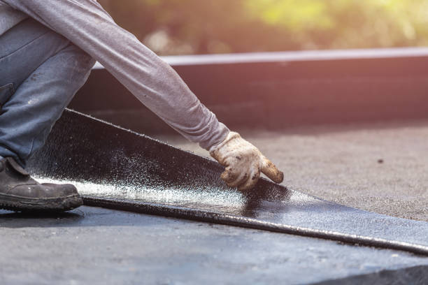 Professional Basement Waterproofing technician working in Carroll, OH